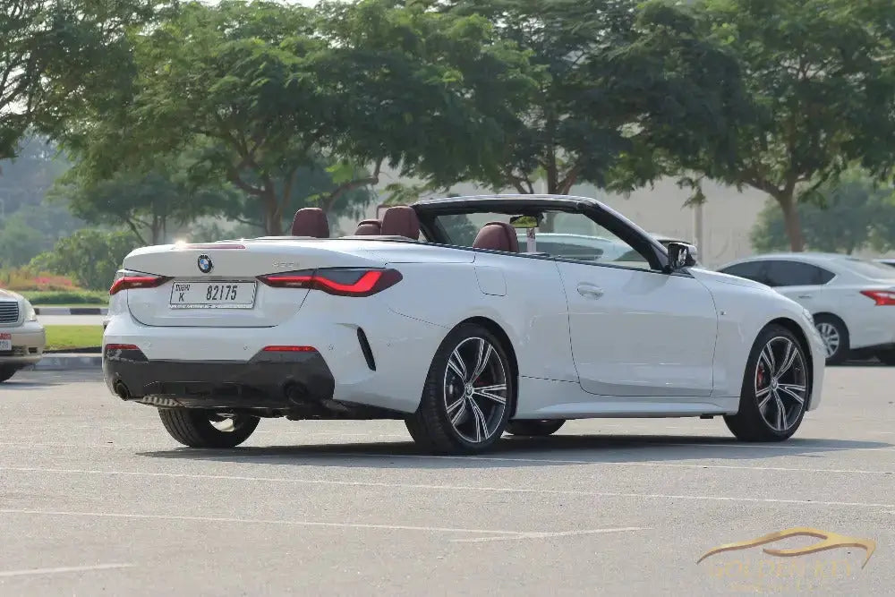 Dubai Airport Transfer - With Bmw 430I 2024 - Golden Key Rent Car LLC