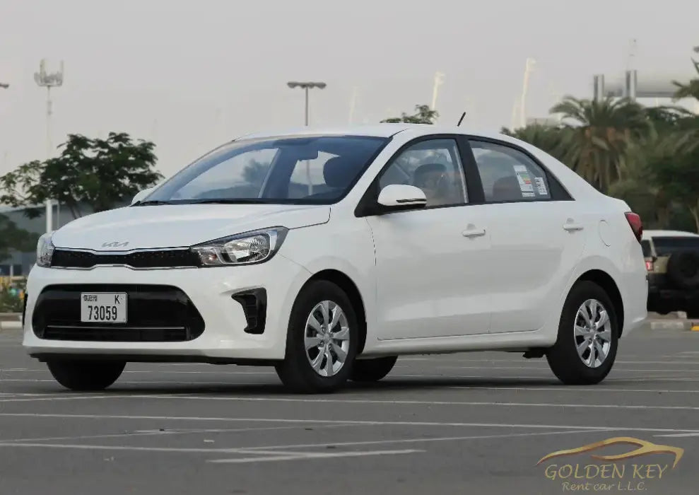 Dubai Airport Transfer - With Kia Pegas 2024 - Golden Key Rent Car LLC