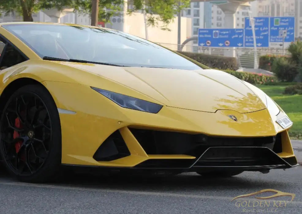 Dubai Airport Transfer - With Lamborghini Huracan Evo Spyder 2023 - Golden Key Rent Car LLC